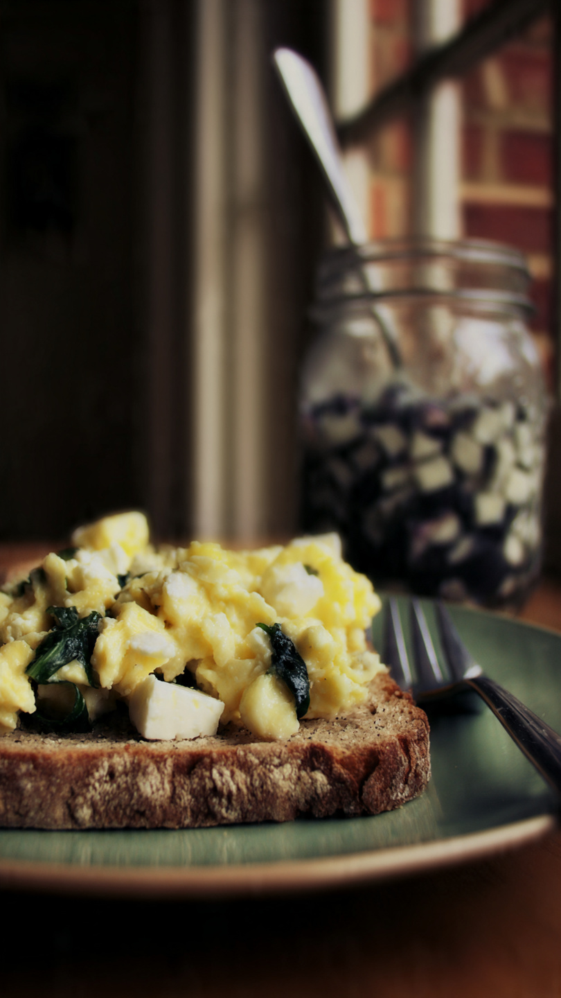 Scrambled Eggs with Feta and Spinach on Whole Wheat Toast