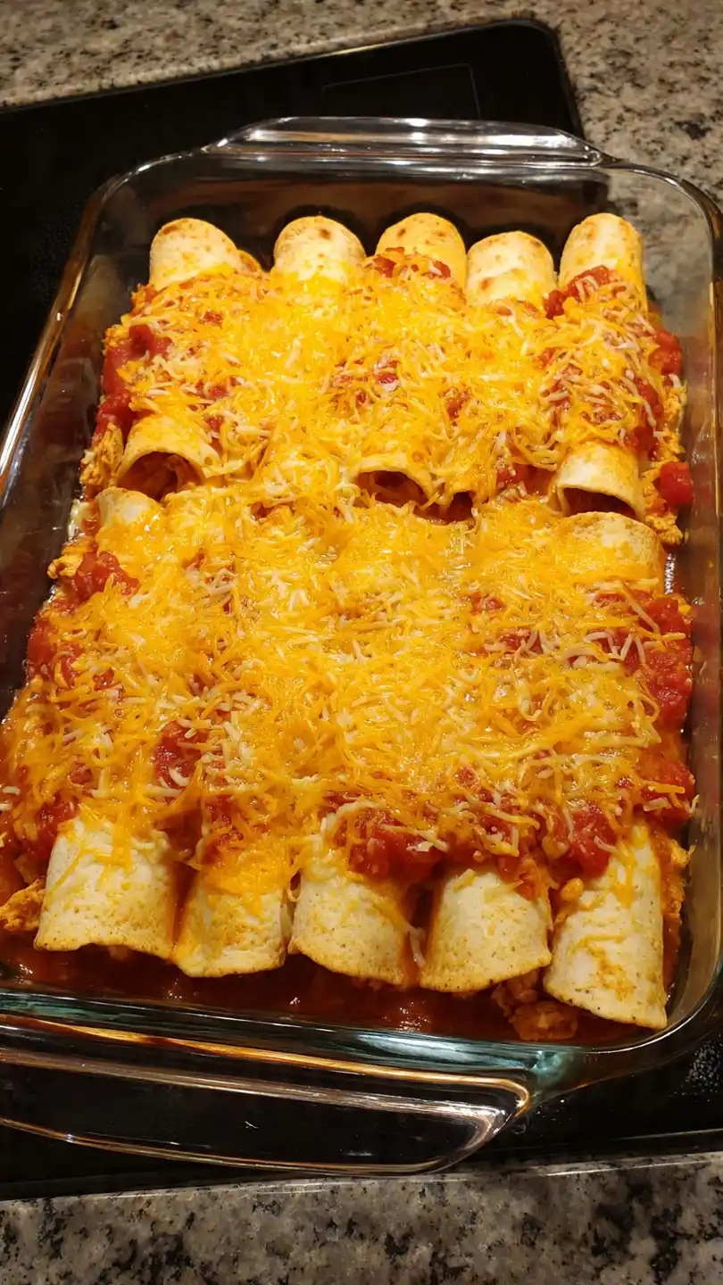 Smother and Top with Cheese Chicken Taquitos Casserole 
